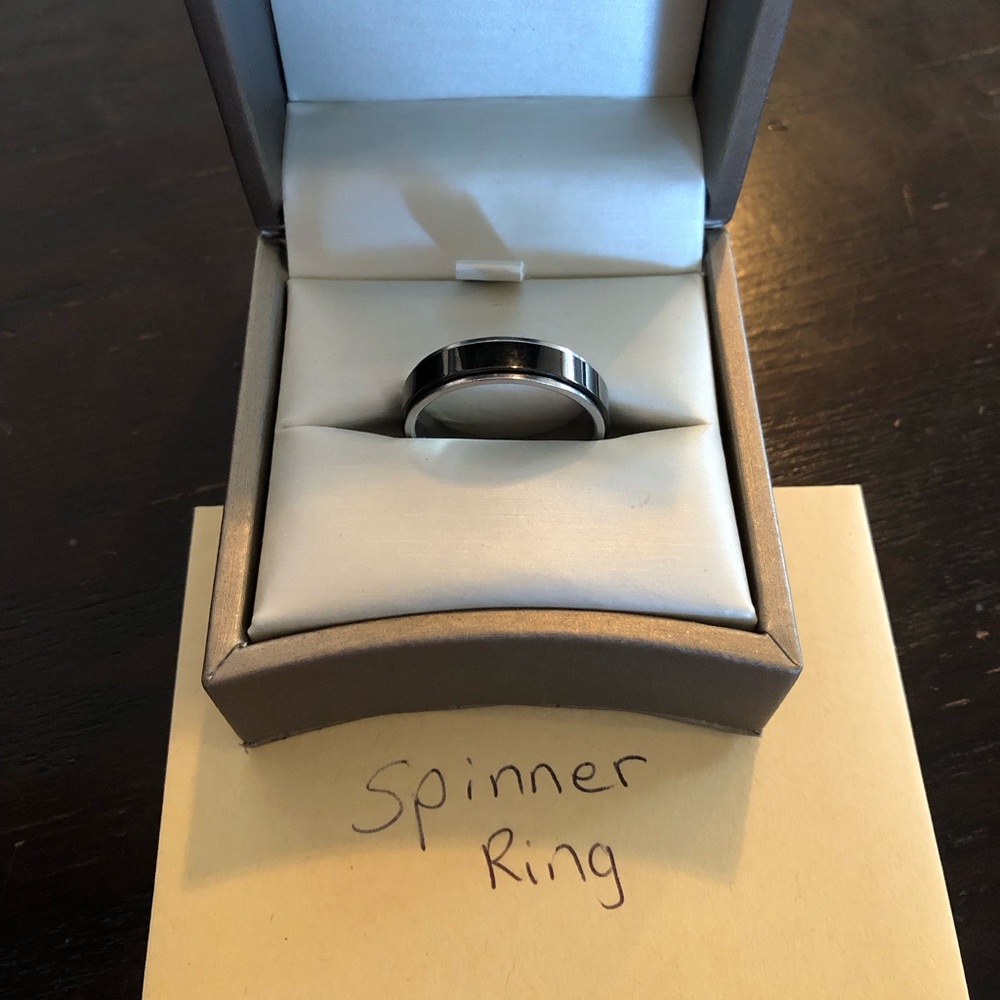 Stainless steel wedding ring spinner